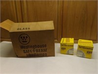 A Dozen Westinghouse 4001 Headlamps