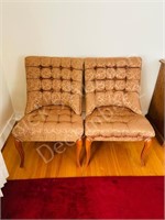 pair of tufted side chairs