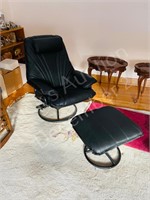 black leather chair with footstool