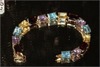10k  yellow gold multi gemstone bracelet