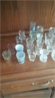 Large group of shot glasses and toothpick h
