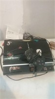 PlayStation 3 with cords and controller