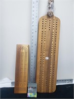 2 cribbage boards and a deck of cards