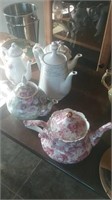 Group of five various teapots