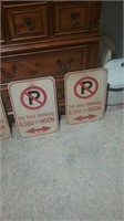 Group of four odd dated Wednesday no parking signs