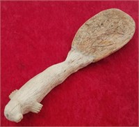 Piece of fossilized bone carved into a spoon by Ro
