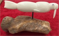 J. Wongittilin ivory carving of a walrus on fossil