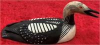 Scrimshaw carving of an Arctic loon by Larry Mayac