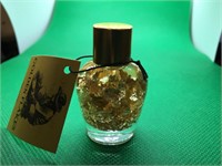 Gold Flakes in Decorative Bottle