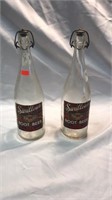 2 swallows root beer bottles