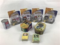 4 figurines Pokémon /cartes avec boitiers métal