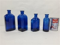4 bouteilles en verre bleu cobalt