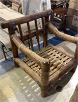 Antique extra large bamboo arm chair. Measures 38