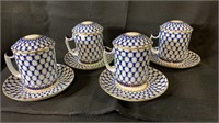 4 Russian porcelain covered hot tea cups &