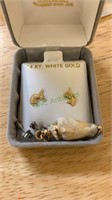 Marked 14 K gold unicorn stud earrings, gold