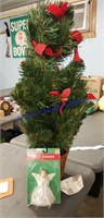 Christmas Tree in a basket with angle topper