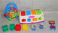 FLAT BOX OF PLASTIC LEARNING TOYS