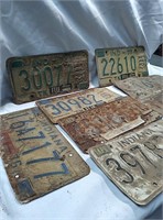 Stack of old license plates