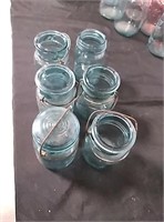 6 short  ball jars 1 with lid
