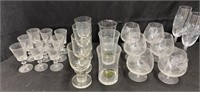 Collection of glass cups, etched glass