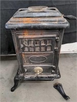 Antique iron wood burning stove, as is