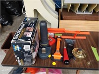 lot of tools , tape measure , window breaker ,