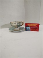 Lusterware teacup and saucer. Made in Japan.