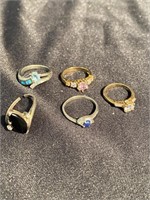 Five Sterling silver rings one with a nice small