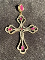 Cross with Ruby colored stones set in sterling