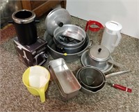 lot of kitchenware, mixing bowls, sifters, etc