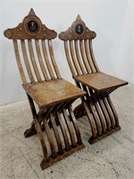 Pair antique figural bone inlaid folding chairs