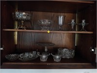 lot of glassware , platters , candle holders etc