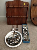 lot of collector spoons and holder