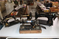 Four Different Singer Sewing Machines.