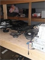 Shelf of speakers and car radios