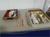 Two boxes miscellaneous jewelry mostly necklaces