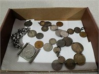 Foreign coins mostly Canadian and most are drilled