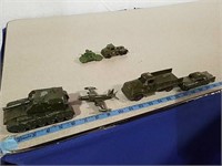 Four military metal vintage vehicles and