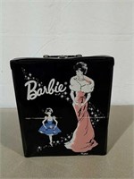 Barbie case marked ponytail 1962 with some clothes