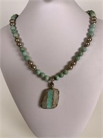 Beaded necklace w/ stone pendant