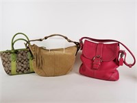 Three Coach handbag purses