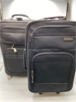 2 carry on suitcases
