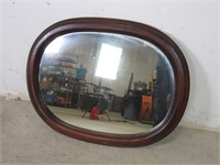 Dark Wood Framed, Oval-Shaped Mirror