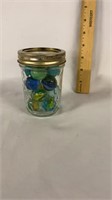 Small jar of shooter marbles