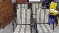 FOUR FOLDING OUTDOOR LAWN CHAIRS
