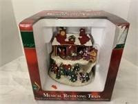 musical christmas revolving train