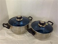 2 pots with blue glass lids