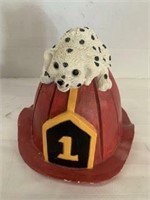 dalmation on a firefighter helmet