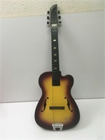 Vintage 60's Emenee Tiger Sunburst Toy Guitar