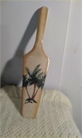 painted pie server with palm trees
